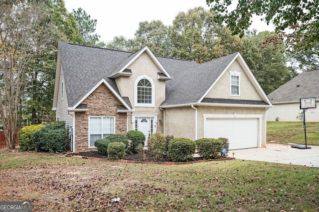 view of front facade featuring a garage and a front lawn