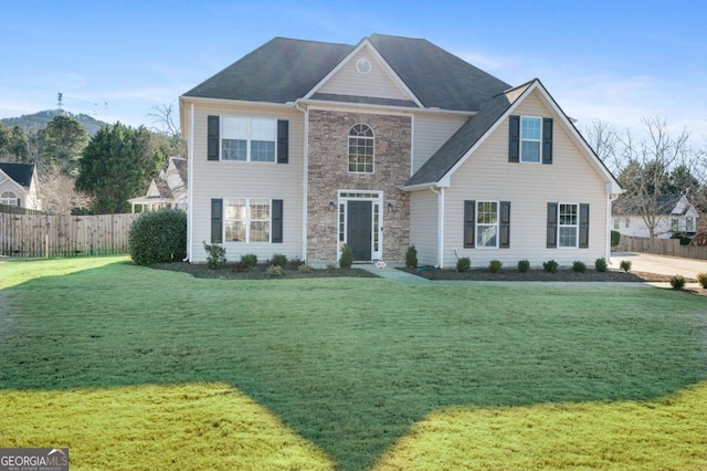 view of front of house featuring a front yard