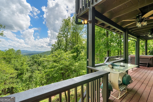 170 Walnut Rdg, Ellijay, GA 30536 - wooden deck with ceiling fan, a hot tub, and a wooded view