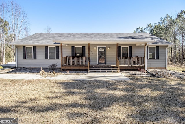 ranch-style home featuring a porch