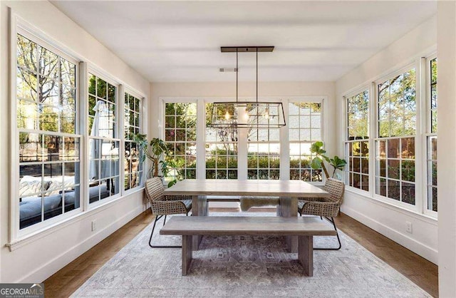 sunroom / solarium featuring a wealth of natural light