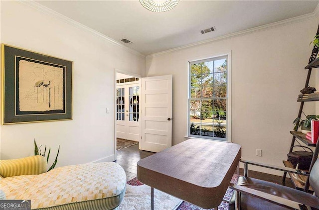 interior space featuring ornamental molding and dark hardwood / wood-style floors