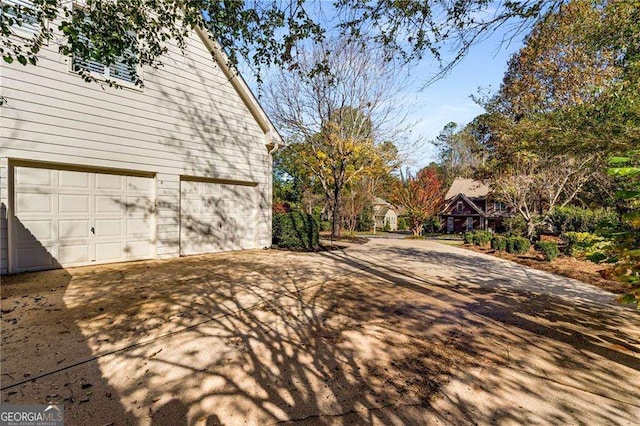 view of property exterior with a garage