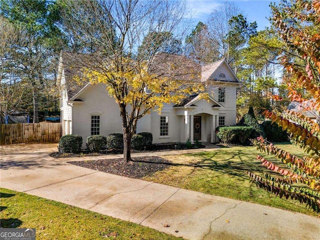 view of front of house with a front lawn