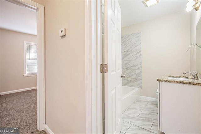 full bathroom with vanity, toilet, and  shower combination