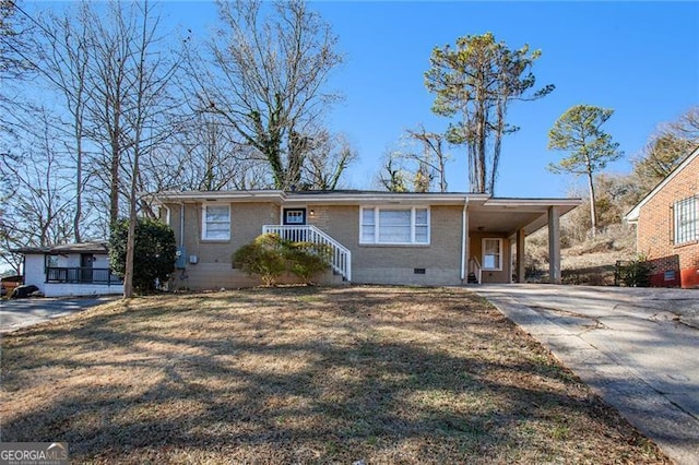 ranch-style home featuring a carport