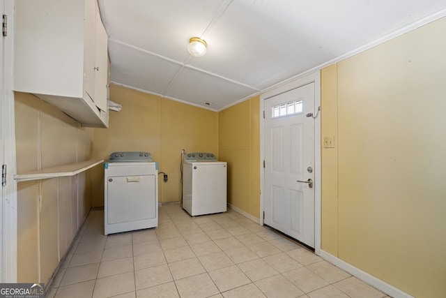 laundry area with cabinets and independent washer and dryer