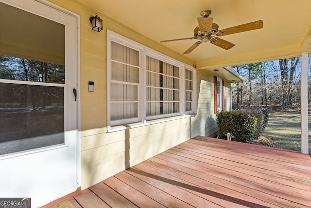 wooden terrace with ceiling fan