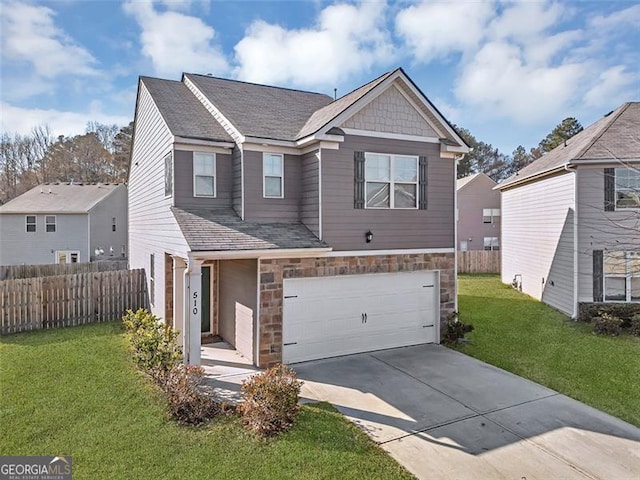 view of front facade featuring a front yard and a garage