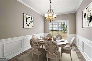 dining room featuring ornamental molding and a notable chandelier