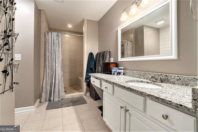 bathroom with tile patterned flooring, vanity, and a shower with curtain