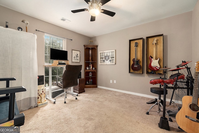 office featuring ceiling fan and carpet