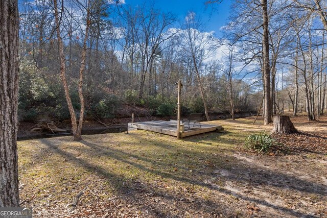 exterior space featuring a wooden deck