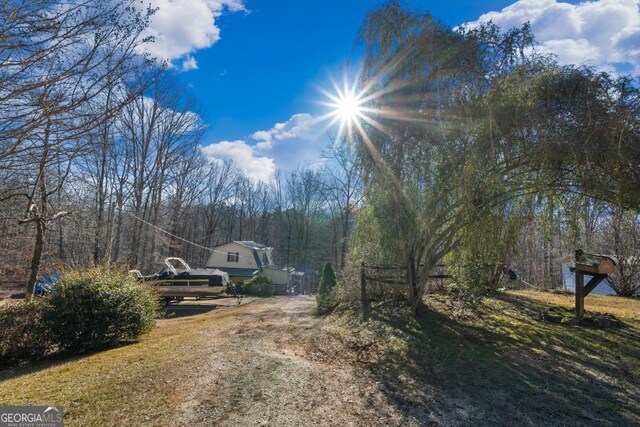 view of yard with a wooden deck