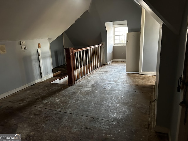 additional living space with lofted ceiling