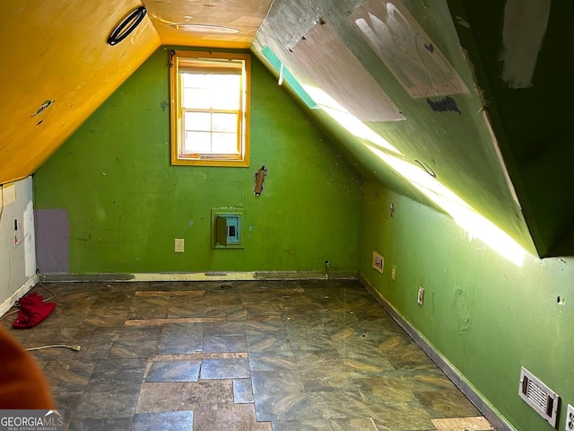 bonus room featuring vaulted ceiling