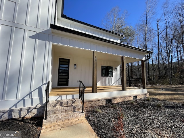 entrance to property with a porch