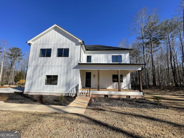 modern farmhouse style home with a porch