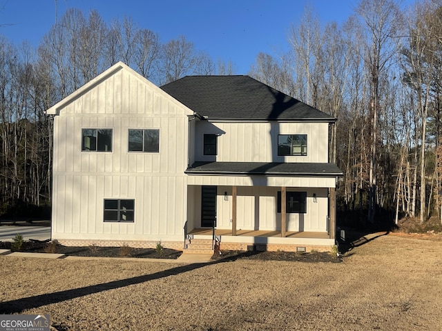 modern farmhouse with a porch