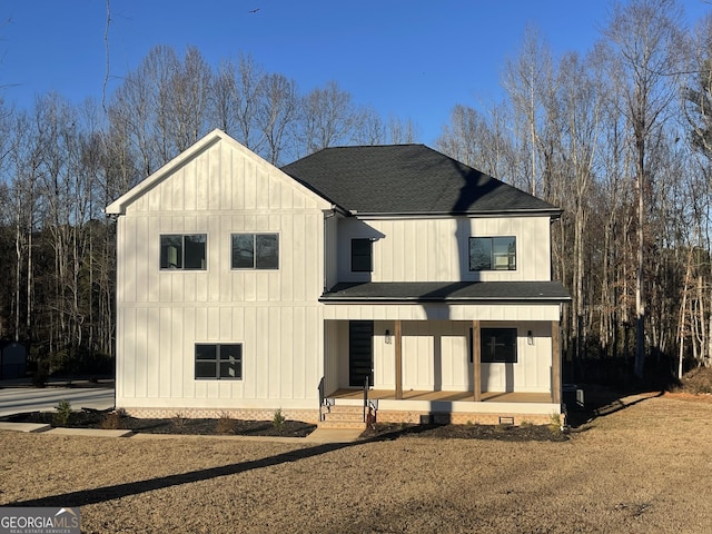 modern farmhouse style home with a porch