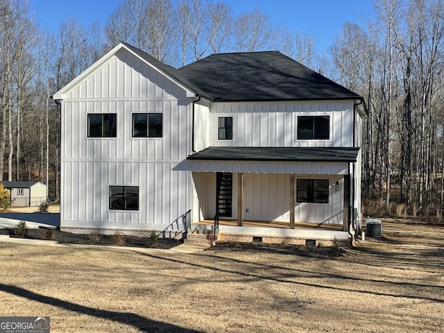 modern farmhouse style home featuring covered porch