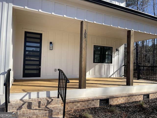 entrance to property with a porch