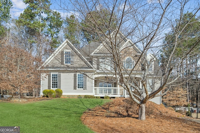 front facade with a front yard