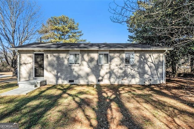 exterior space featuring a front lawn