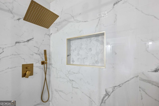 details featuring a tile shower