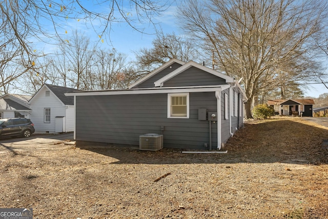 view of home's exterior featuring cooling unit