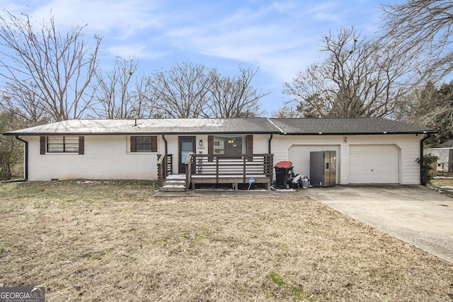 ranch-style home with a garage