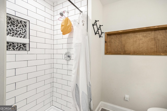 bathroom with curtained shower