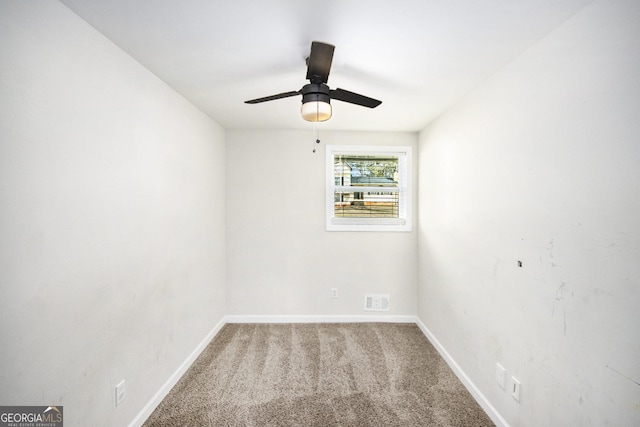 carpeted empty room with ceiling fan