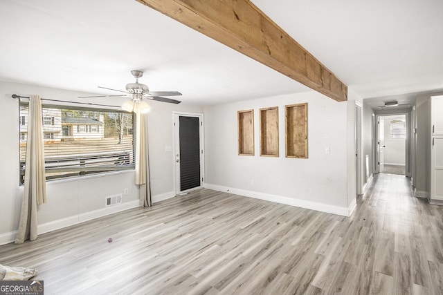 spare room featuring ceiling fan and light hardwood / wood-style floors