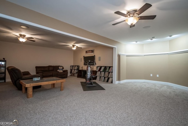 carpeted living room featuring ceiling fan