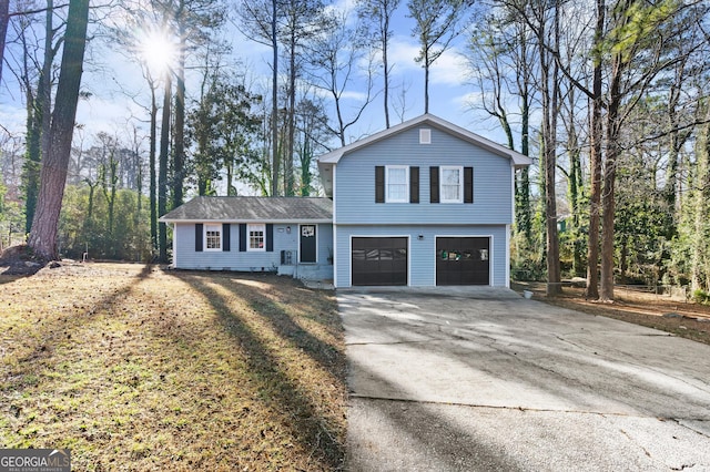 view of front of property with a garage