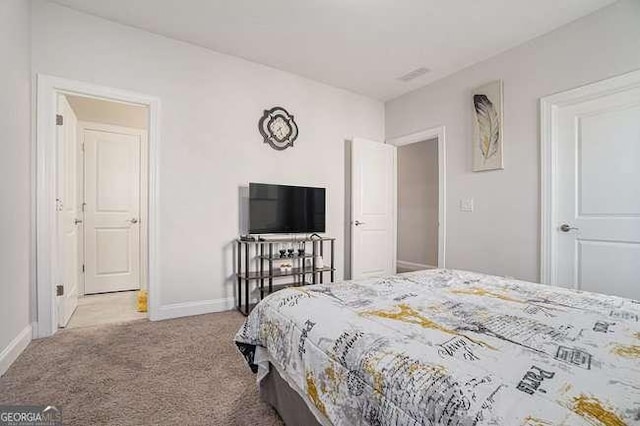 bedroom featuring carpet flooring