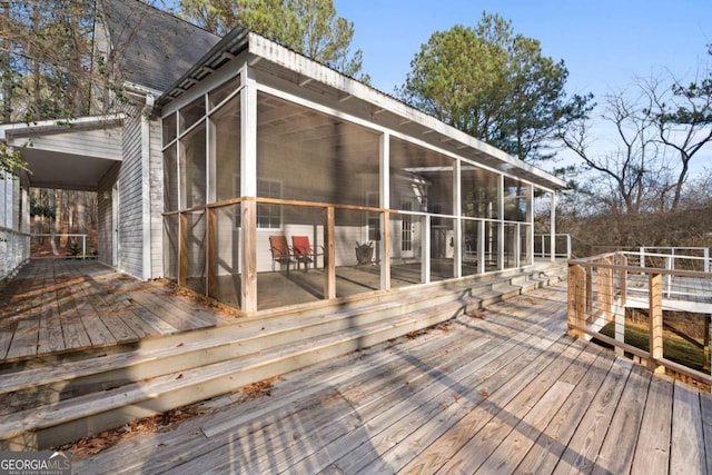 wooden terrace with a sunroom