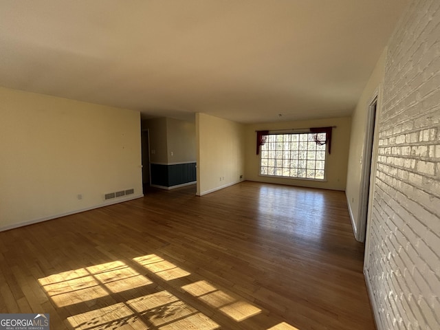 unfurnished room featuring light hardwood / wood-style flooring