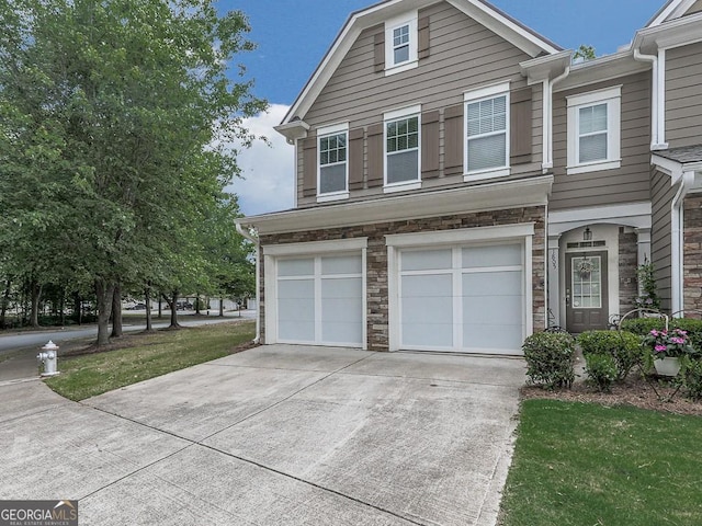 view of front of home with a garage