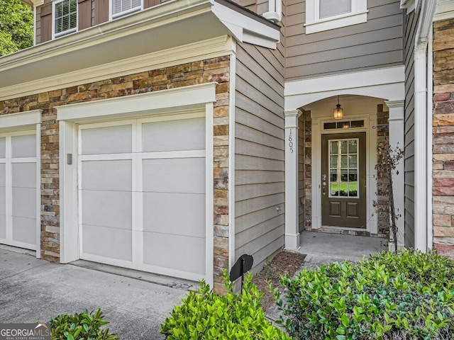 property entrance with a garage