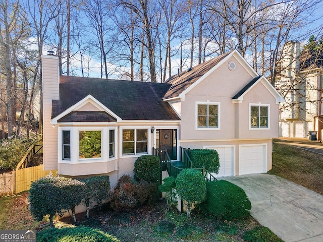 view of front of property with a garage