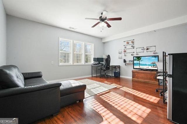 office area with dark hardwood / wood-style floors and ceiling fan