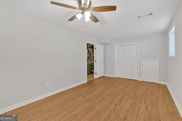 interior space with light hardwood / wood-style flooring and ceiling fan