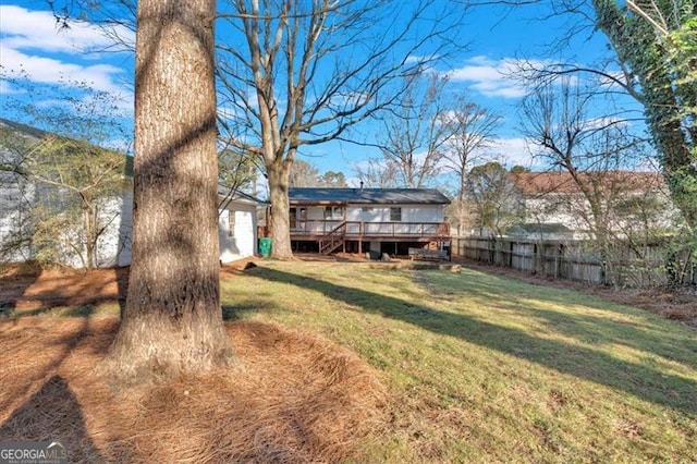 view of yard with a deck