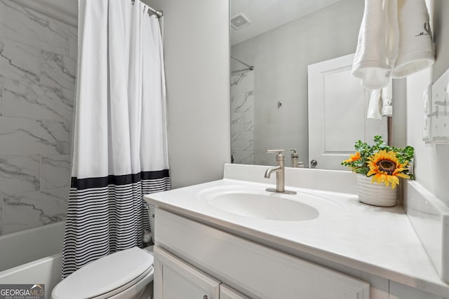 full bathroom with toilet, vanity, and shower / bath combo