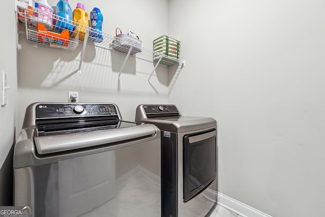 washroom featuring separate washer and dryer