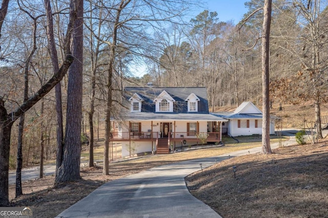 cape cod house with covered porch