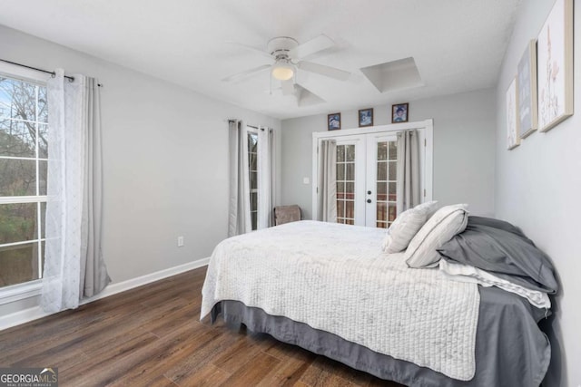 bedroom with ceiling fan, dark hardwood / wood-style flooring, access to outside, and french doors