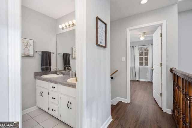 bathroom featuring vanity and ceiling fan